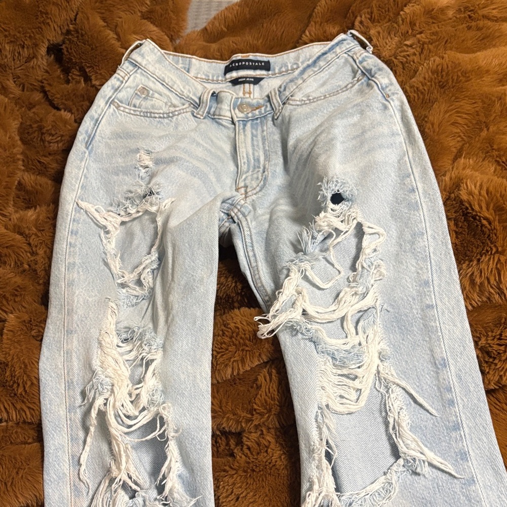 Distressed Light Blue Jeans